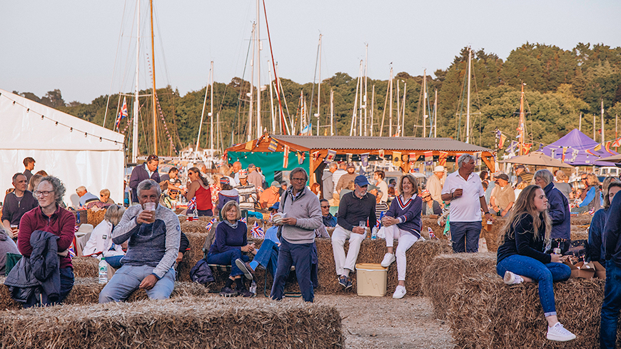 Mooring and Berth holders sat on hay bales in the Buckler's Hard Yacht Harbour