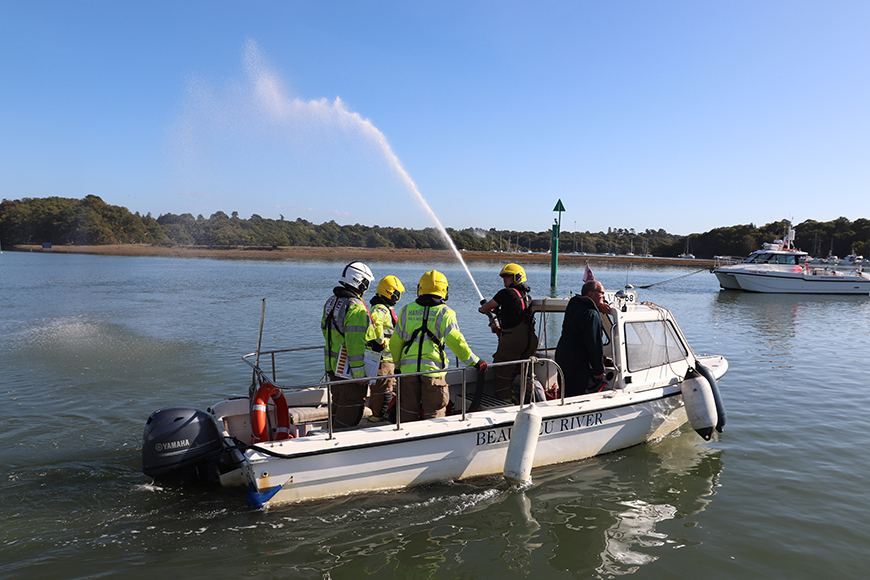 Beaulieu River team members carrying out an oil spill exercise