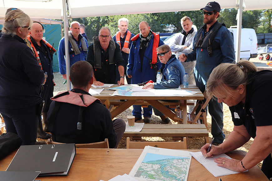 Beaulieu River team members carrying out an oil spill exercise