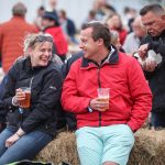 Two mooring holders laughing