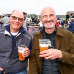 Two mooring holders smiling for the camera